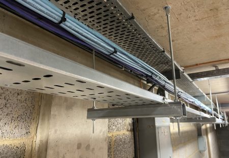 Empty carpark and suspended cables